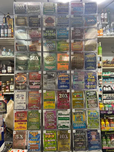 Variety of scratch‑off lottery tickets displayed in clear cases