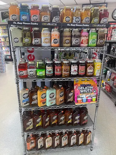 Shelves filled with jars of flavored moonshine and spirits