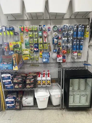 Fishing supplies and small household items on shelves